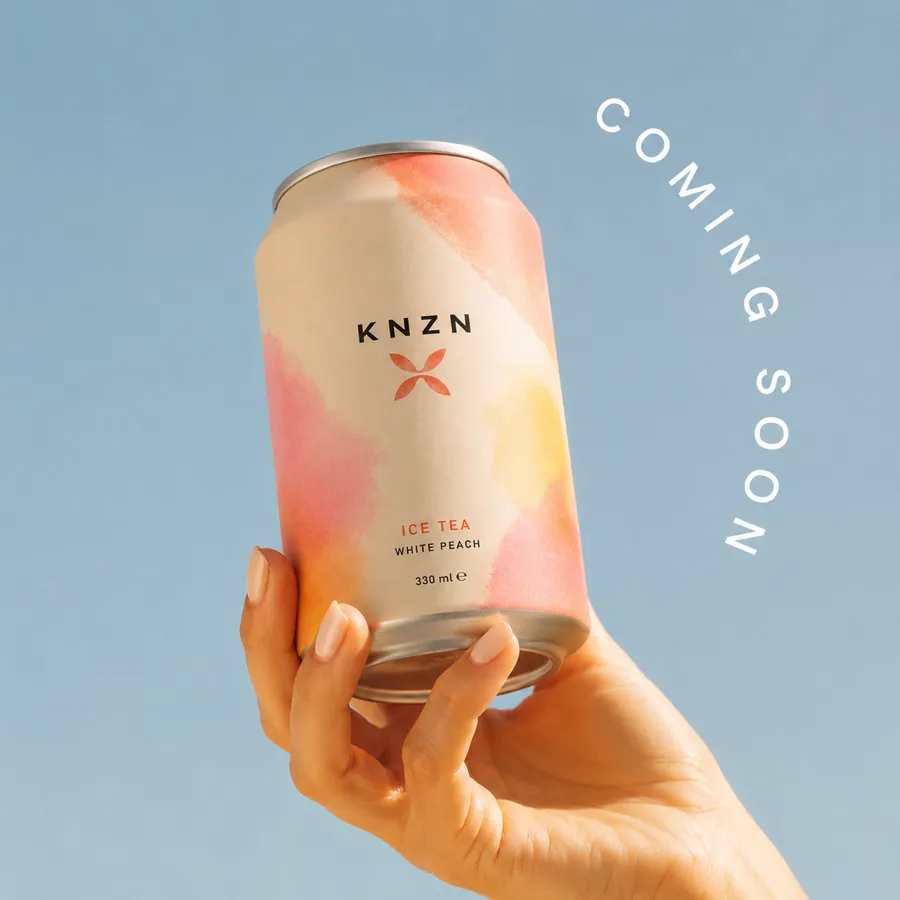 KNZN Dose vor blauem Himmel — Coming Soon